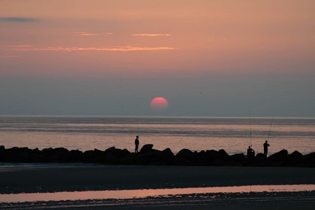 Ostsee Sonnenuntergang Angler